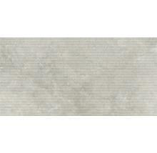 Carreau de mur aspect pierre avec structure rainurée horizontale.