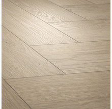 Sol stratifié aspect bois avec motif chevron pour l'intérieur.