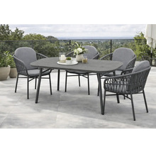 Ensemble de mobilier de jardin moderne composé d une table ovale et de quatre fauteuils avec tressage en corde et coussins sur une terrasse.