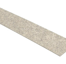 Plinthe en grès cérame aspect granit, rectangulaire et finement mouchetée.