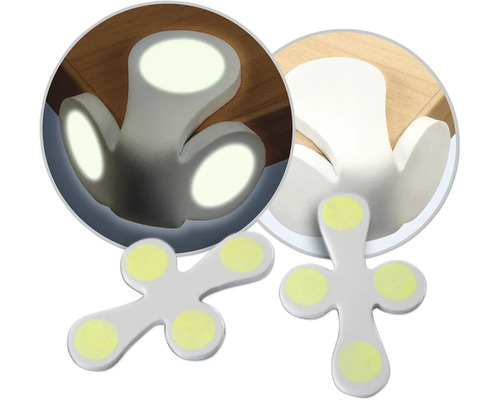 Nachleuchtender Ecken- und Kantenschutz aus Kunststoff für Möbel an einer Tischkante.