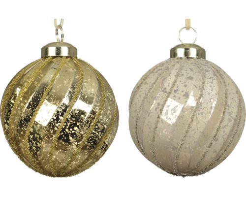 Boules de Noël en verre avec rayures pailletées diagonales et aspect moucheté, or et champagne.