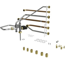 Kit de raccordement pour chauffage avec tuyaux métalliques, bagues d'étanchéité et accessoires de montage.