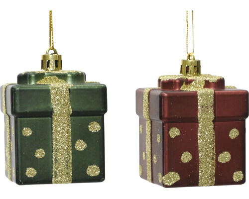 Zwei Weihnachtsbaumschmuck-Anhänger an der Form vu Geschenkpakete mat glitzernde Bänner a Punkten an goldene Spunnen.
