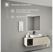 Moderner Waschtisch mit weißem Durchlauferhitzer, Aufsatzbecken auf Holzunterschrank und LED-Spiegel, inklusive elektronischem Sicherheitssystem.