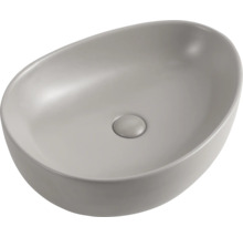 Vasque à poser ovale en céramique sans trou de robinetterie.