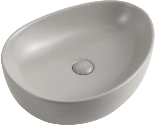 Vasque à poser ovale en céramique sans trou de robinetterie.