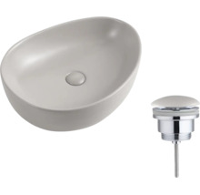 Vasque à poser ovale en céramique gris mat avec bonde de vidage assortie.