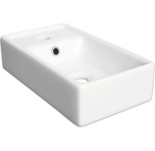 Vasque à poser rectangulaire en céramique blanche avec trou pour robinet et trop-plein.