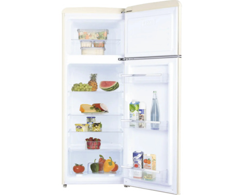 Réfrigérateur rétro beige avec congélateur en haut, ouvert, rempli d'aliments sur des clayettes en verre.