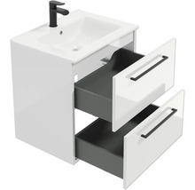 Meuble sous-vasque moderne blanc avec deux tiroirs ouverts, vasque blanche et robinet noir.