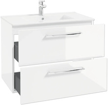Meuble sous-vasque blanc avec lavabo et mitigeur, deux tiroirs ouverts avec poignées chromées.
