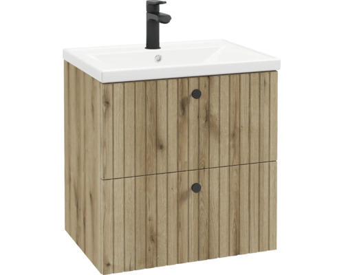 Meuble sous-vasque aspect bois avec structure rainurée, deux tiroirs avec boutons noirs, vasque blanche et robinet noir.