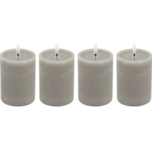 Set aus vier grauen LED-Stumpenkerzen aus Wachs.