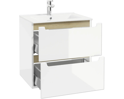 Meuble sous-vasque blanc brillant avec deux tiroirs ouverts, détails aspect bois, lavabo et mitigeur chromé.