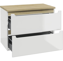 Meuble sous-vasque avec deux tiroirs légèrement ouverts, façade blanc brillant et plateau en bois aspect chêne.