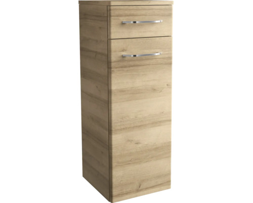 Meuble bas de salle de bains aspect bois avec un tiroir, une porte et des poignées en métal.