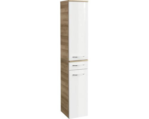 Armoire haute de salle de bain moderne avec deux portes et un tiroir, corps en aspect chêne, façades en blanc brillant, poignées chromées. Armoire haute de salle de bain moderne avec deux portes et un tiroir, corps en aspect chêne, façades en blanc brillant, poignées chromées.