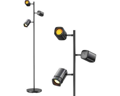 Lampadaire moderne noir avec trois spots réglables sur une tige fine et un socle rond.