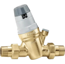 Réducteur de pression Caleffi en laiton avec échelle de réglage et raccords filetés pour installation hydraulique.