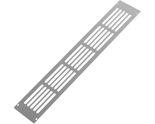 Grille d'aération rectangulaire en métal avec plusieurs fentes de ventilation et trous de fixation aux coins.