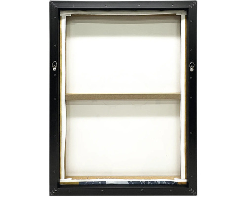 Vue arrière d'un tableau sur toile dans un cadre caisse américaine noir avec châssis et attaches métalliques.