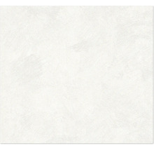 Papier peint intissé avec structure fine de crépi et effet de pinceau.