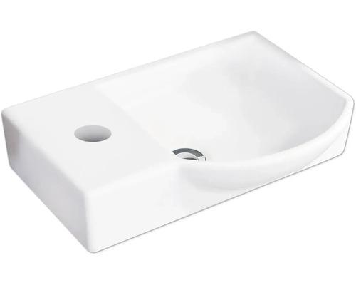 Lavabo en céramique avec trou de robinetterie latéral et vasque intérieure arrondie.