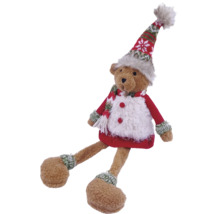 Ours en peluche de Noël avec bonnet pointu, écharpe et pull rouge.