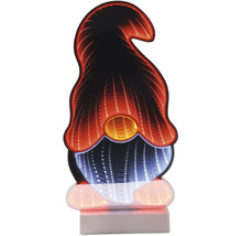 Décoration LED en forme de lutin avec effet miroir infini et socle.