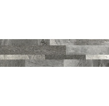 Plaquettes de parement aspect pierre naturelle avec surface structurée en différentes nuances de gris.