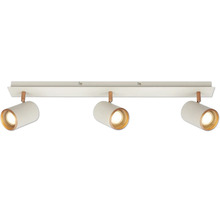 Projecteur de plafond avec trois têtes de spot cylindriques orientables en métal blanc avec des accents cuivrés.