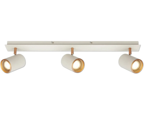 Projecteur de plafond avec trois têtes de spot cylindriques orientables en métal blanc avec des accents cuivrés.