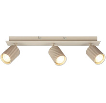 Plafonnier avec trois spots orientables, forme cylindrique rainurée, couleur sable.