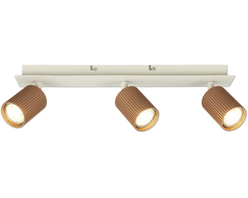 Spot de plafond à 3 lampes avec rail blanc et abat-jour cylindriques marron et nervurés.