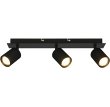 Plafonnier à trois spots noir avec abat-jour cylindriques rainurés et orientables.
