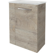 Meuble sous-vasque aspect bois avec lavabo blanc et poignée métallique.