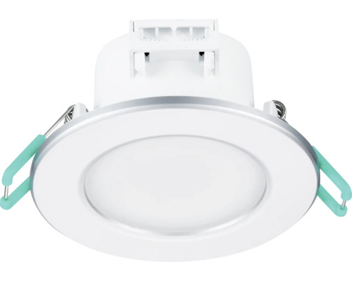 Runder LED Einbaustrahler mit Montageklammern und matter Abdeckung für den Deckeneinbau.