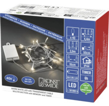 Guirlande lumineuse LED Konstsmide pour extérieur, blanc chaud, 40 lampes, câble transparent, fonctionnement sur piles avec minuterie.