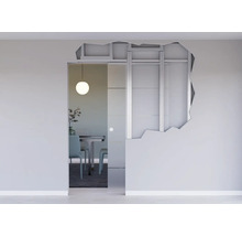 Système de porte coulissante en verre escamotable avec ossature métallique et plaques de plâtre dans un intérieur moderne.