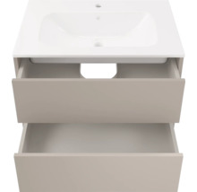 Meuble sous-vasque beige avec deux tiroirs ouverts et lavabo blanc, design sans poignée.