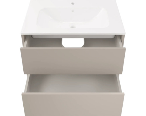 Meuble sous-vasque beige avec deux tiroirs ouverts et lavabo blanc, design sans poignée.