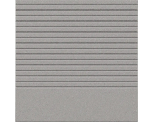 Carreau de marche en grès cérame avec structure rainurée sur la partie supérieure et surface lisse en bas.