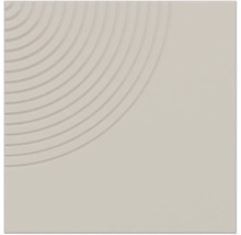 Carreau en céramique carré beige clair avec une surface mate et un motif en relief de quarts de cercles concentriques dans un angle.