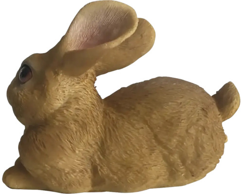 Figurine de lapin décorative assise avec aspect fourrure structuré.