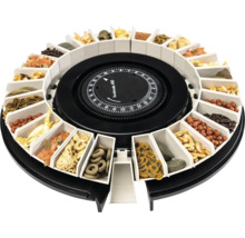 Distributeur automatique de nourriture Rondomatic 400 pour aquarium avec compartiments circulaires remplis de différents types d'aliments.