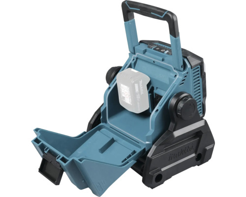 Lampe de chantier sans fil Makita avec compartiment à batterie ouvert et batterie insérée