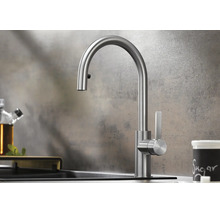 Mitigeur de cuisine moderne avec douchette extractible en acier inoxydable pour évier.