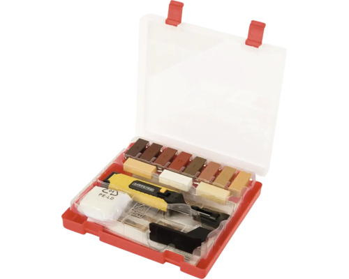Kit de réparation pour surfaces en bois dans un coffret en plastique avec bâtons de cire et racloir