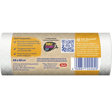 Swirl Müllbeutel auf Rolle mit Informationen zu Materialbeschaffenheit und Nachhaltigkeit auf der Verpackungsrückseite.